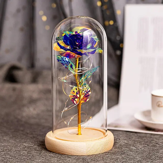  Long-lasting artificial flowers in a dome for effortless décor in any setting.